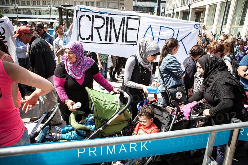 DEU Germany Germany Berlin Opening of a Primark movie at Alexanderplatz. Protests by several groups against cheap fashion and product conditions