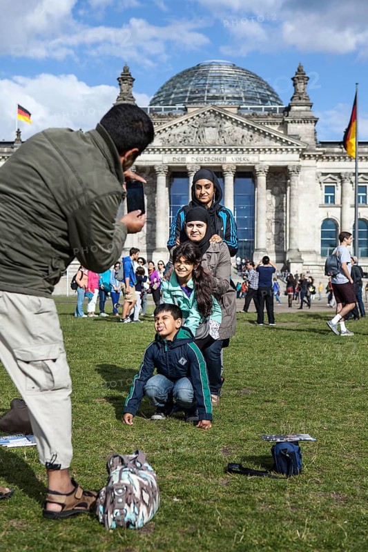 DEU Germany Germany Berlin Tourists take pictures of themselves in front of the Reichstag