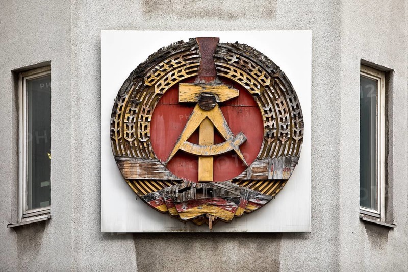 Old building of the Wall Museum — Museum Haus am Checkpoint Charlie with old GDR coat of arms, Friedrichstraße, Kreuzberg, Berlin, Germany
