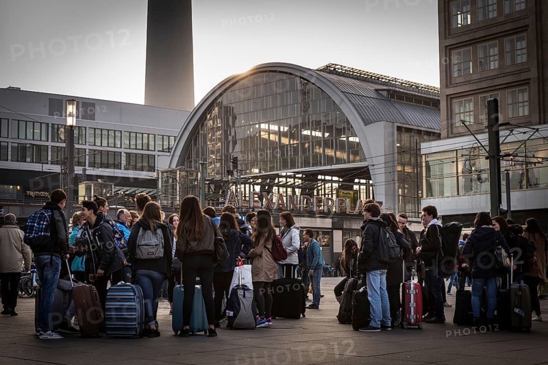 DEU Germany Germany Berlin Visiting students on Alexanderplatz. You will be picked up by host families