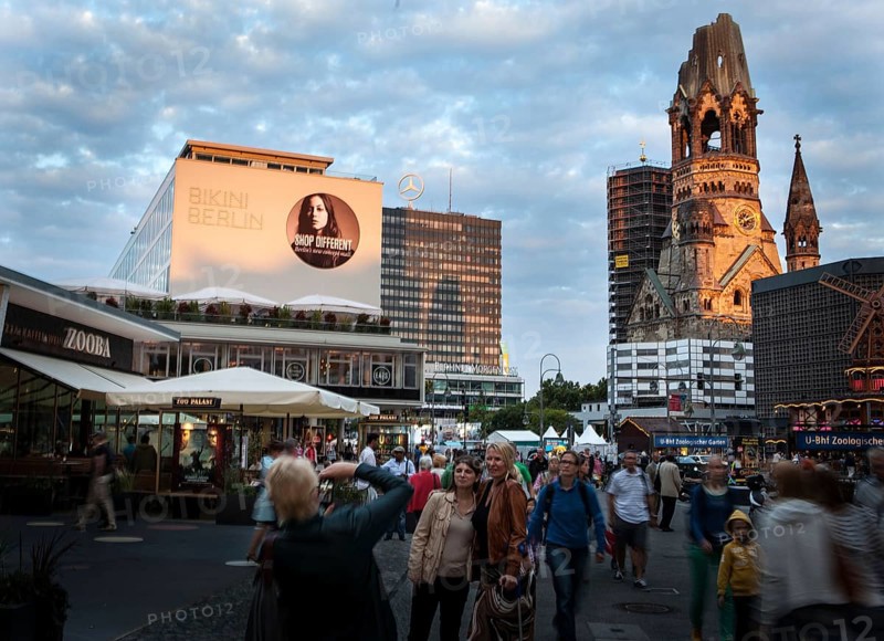 DEU Germany Germany Berlin The new bikini house and memorial church are illuminated by warm evening light