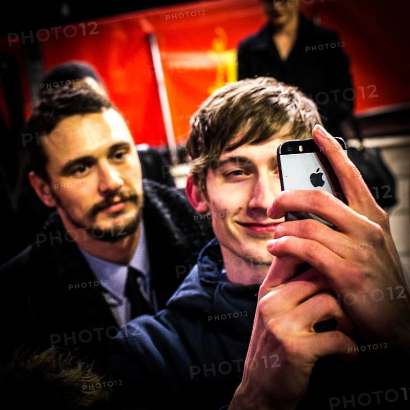 DEU Germany Germany Berlin 65th Berlinale, the international film festival in the German capital. James Franco with selfie-making fan on the red carpet for the Wenders film 'Everything will be fine'