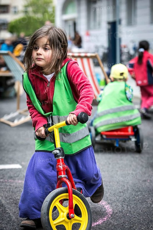 DEU Germany Germany Berlin Children play on Gudvanger Straße, which has been declared the city's first temporary play street. Parents, daycare and a school had worked to temporarily close the road on Oberen Prenzlauer Berg to road traffic