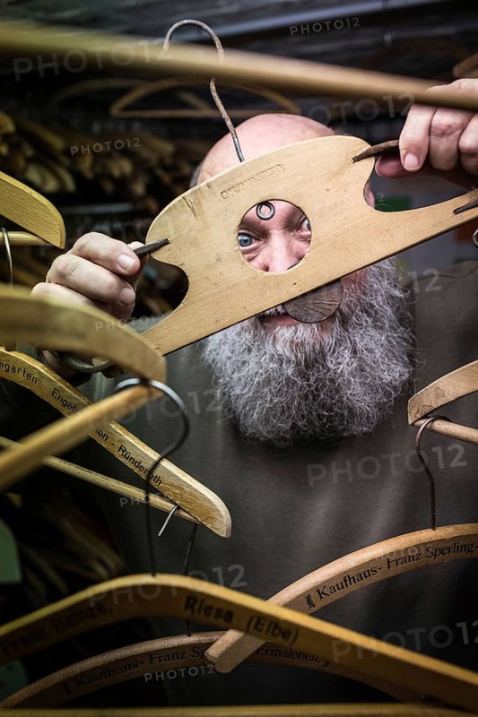 DEU Germany Germany Berlin iron collector Eberhard Rhode from Berlin-Karlshorst with his collectibles