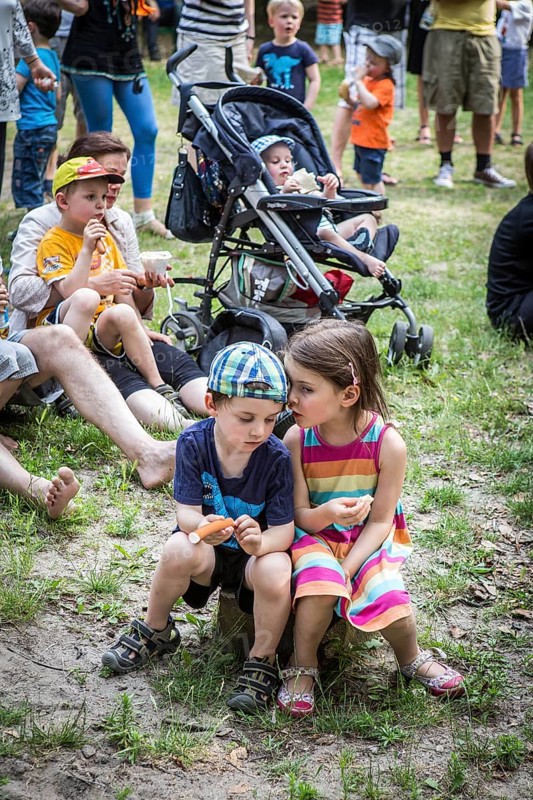 DEU Germany Germany Berlin Summer party at the Northwest daycare center on Prager Platz. Children whispering