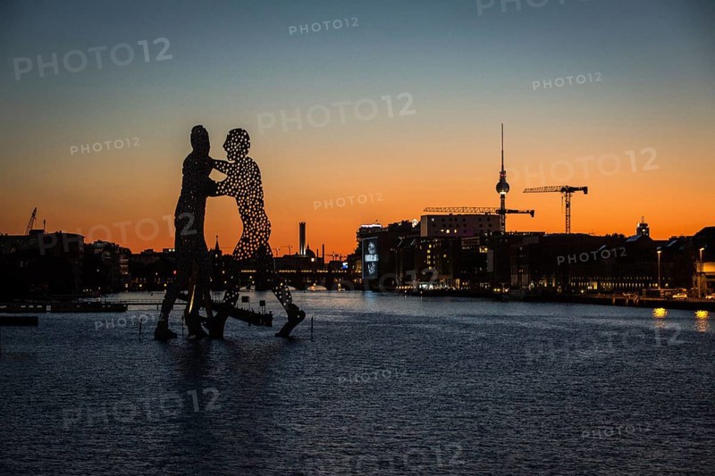 DEU Germany Germany Berlin View over Osthafen across the Spree towards Alex at sunset