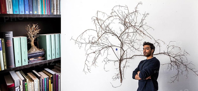 DEU Germany Germany Berlin The Tamil writer Senthuran Varatharjara in his Berlin apartment