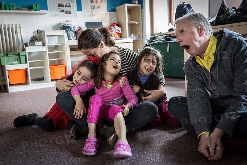 DEU Germany Germany Berlin An animation team entertains refugee children in an asylum center in Berlin