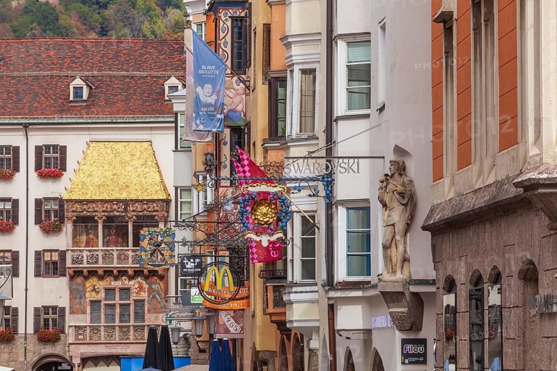 Golden roof, lots of people and historic houses in Herzog-Friedrich-Straße, Altstadt, Innsbruck, Tyrol, Austria