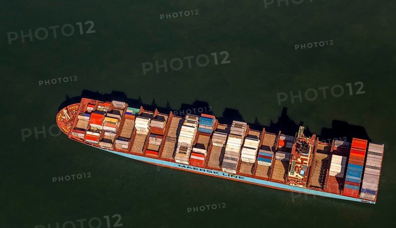 Container ship Maersk Lavras at anchor, aerial view, cargo ships at anchor off Spiekeroog, shipping line, shipping route, at sea, coastal waters, Spiekeroog, North Sea, North Sea island, East Frisian Islands, Lower Saxony, Germany, Europe, birds-eyes view, aerial view, aerial photography, aerial photography, overview, bird's eye view
