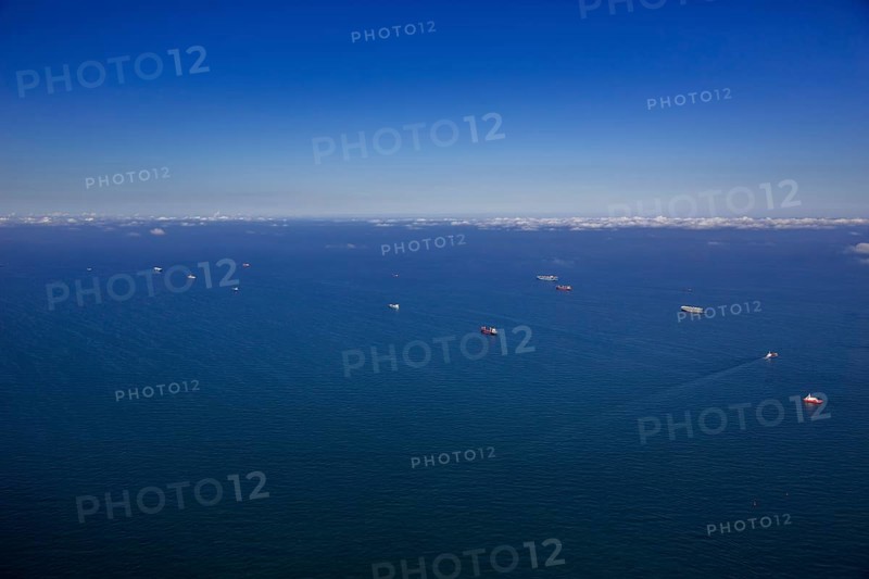Aerial view, cargo ships at anchor off Spiekeroog, shipping lane, shipping route, at sea, coastal waters, Wangerooge, North Sea, North Sea island, East Frisian Islands, Lower Saxony, Germany, Europe, birds-eyes view, aerial view, aerial photography, aerial photography, overview, bird's eye view