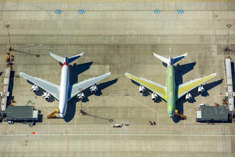 Airbus A380 for Emirates in front of completion on the apron, Finkenwerder Airport, Finkenwerder Airport, Hamburg, Free and Hanseatic City of Hamburg, Germany, Europe, aerial photograph, birds-eyes view, aerial photography, aerial photography, overview, bird's eye view