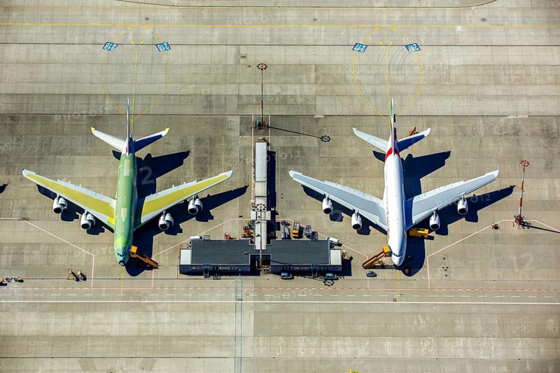 Airbus A380 for Emirates in front of completion on the apron, Finkenwerder Airport, Finkenwerder Airport, Hamburg, Free and Hanseatic City of Hamburg, Germany, Europe, aerial photograph, birds-eyes view, aerial photography, aerial photography, overview, bird's eye view