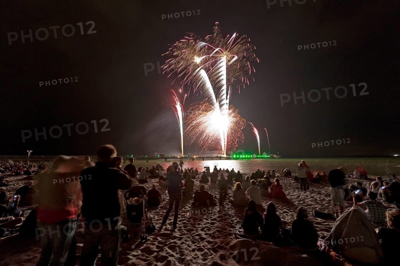 Baltic Sea in flames at Grömitz pier, fireworks, highlight of the season, end of the season, beach, spectators, beach chairs at night, shower of sparks, Baltic Sea resort, tourist attraction, Grömitz, Baltic Sea, Schleswig-Holstein, Germany, Europe, aerial photo, birds-eyes view, aerial photography, aerial photography, overview, overview, bird's-eye view