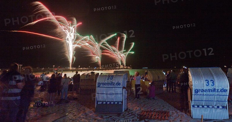 Baltic Sea in flames at Grömitz pier, fireworks, highlight of the season, end of the season, beach, spectators, beach chairs at night, shower of sparks, Baltic Sea resort, tourist attraction, Grömitz, Baltic Sea, Schleswig-Holstein, Germany, Europe, aerial photo, birds-eyes view, aerial photography, aerial photography, overview, overview, bird's-eye view