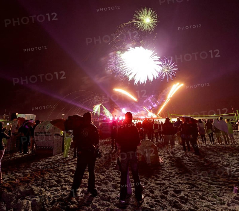 Baltic Sea in flames at Grömitz pier, fireworks, highlight of the season, end of the season, beach, spectators, beach chairs at night, shower of sparks, Baltic Sea resort, tourist attraction, Grömitz, Baltic Sea, Schleswig-Holstein, Germany, Europe, aerial photo, birds-eyes view, aerial photography, aerial photography, overview, overview, bird's-eye view