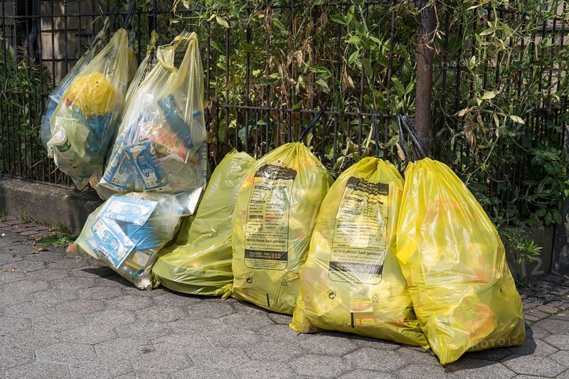 Yellow bags for plastic waste are lying on the side of the road, waste separation, waste disposal, Bayreuth, Upper Franconia, Franconia, Bavaria, Germany