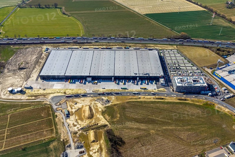 Aerial view, new construction Woolworth headquarters and logistics centre, commercial area Unna Kamen, Unna, Ruhr area, North Rhine-Westphalia, Germany, DE, Europe, commercial enterprises, commercial area, commercial park, commercial location, commercial use, freight traffic, industrial area, industrial location, logistics, logistics centre, aerial photograph, aerial photography, aerial photography, overview, bird's-eye view, bird's-eye view, overview