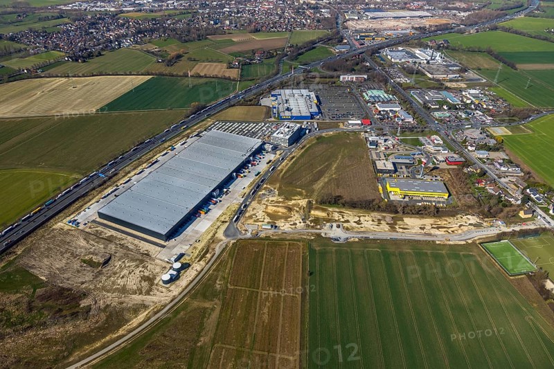 Aerial view, new Woolworth headquarters and logistics centre, commercial area Unna Kamen, Ikea, Unna, Ruhr area, North Rhine-Westphalia, Germany, A1 motorway, DE, Europe, commercial enterprises, commercial area, commercial park, commercial location, commercial use, freight traffic, industrial area, industrial location, logistics, logistics centre, aerial view, aerial photography, aerial photography, overview, bird's-eye view, overview