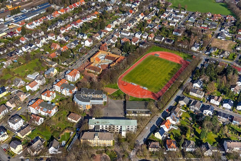 Aerial view, Peter-Weiss-Gesamtschule, old building, Herderstadion, Unna, Ruhr area, North Rhine-Westphalia, Germany, arena, education, educational institution, DE, single-family homes, Europe, comprehensive school, property tax, real estate, educational institute, aerial photography, aerial photography, terraced houses, school, sports facilities, sports field, sports facility, overview, bird's-eye view, residential complex, living and life, residential area, residential buildings, residential quality, residential neighbourhood, housing estate, birds-eyes view, overview
