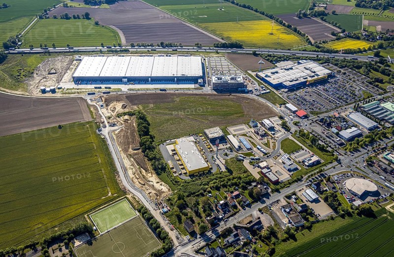 Aerial view, new Woolworth headquarters and logistics centre, commercial area Unna Kamen, Ikea furniture store, Unna, Ruhr area, North Rhine-Westphalia, Germany, A1 motorway, DE, Europe, commercial enterprises, commercial area, commercial park, commercial location, commercial use, freight traffic, industrial area, industrial location, logistics, logistics centre, aerial view, aerial photography, aerial photography, overview, bird's-eye view, overview