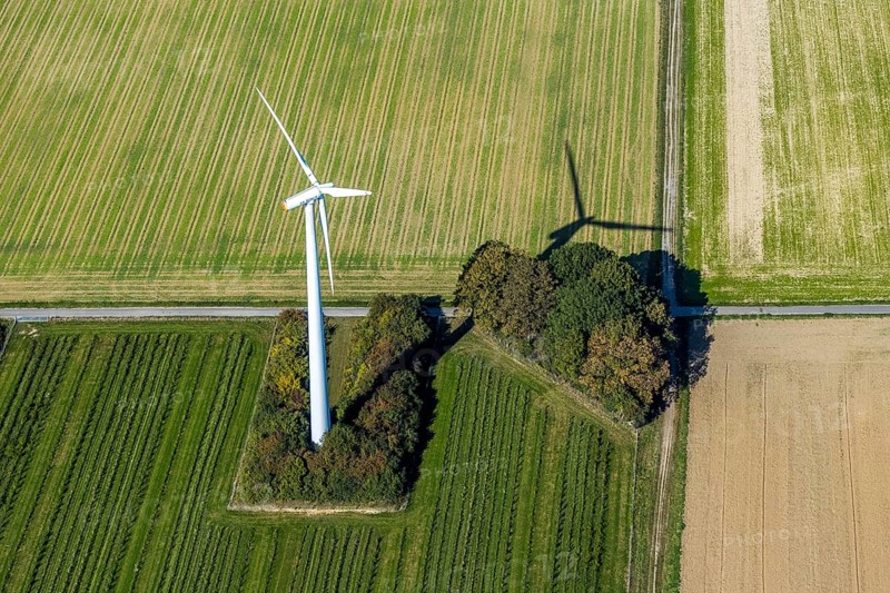 Aerial view, wind turbine in the field, Am Predigtstuhl, Unna, Ruhr area, North Rhine-Westphalia, Germany, DE, energy, energy industry, Europe, shapes and colours, green trees, aerial view, aerial photography, aerial photography, shadow casting, electricity, overview, bird's-eye view, WTG, meadows and fields, wind energy, wind turbine, wind power, wind turbine, wind wheels, birds-eyes view, overview