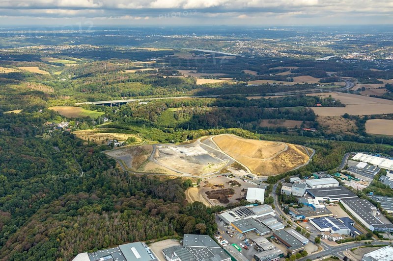 Aerial view, overburden dump Zechenweg, Hefel, industrial area Röbbeck, Stahlstraße, Röbbeck, Velbert, Ruhr area, North Rhine-Westphalia, Germany, overburden dump, motorway A44, motorway bridge, bridge, DE, Europe, distant view, commercial enterprises, commercial area, commercial park, commercial site, commercial use, Hesperbach, industrial area, industrial site, aerial view, aerial photography, aerial photography, nature reserve, overview, bird's-eye view, forest area, meadows and fields, birds-eyes view, onlyVelbert, overview, Velbert-Mitte