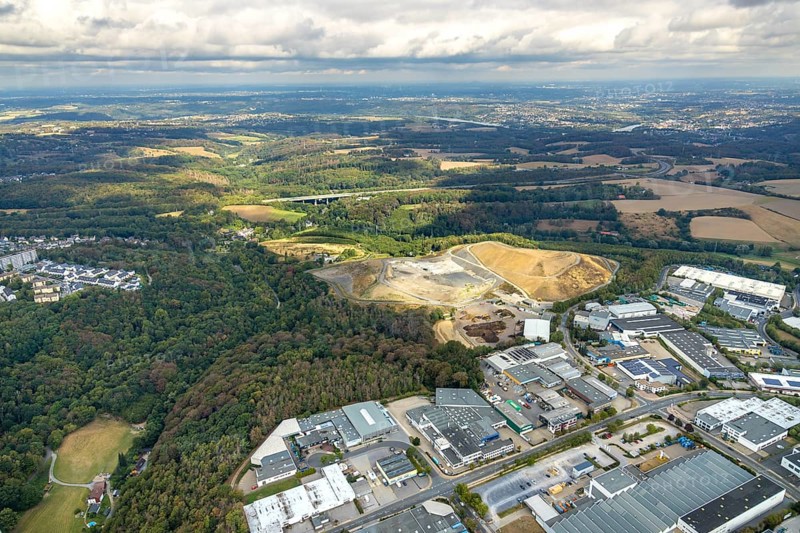 Aerial view, overburden dump Zechenweg, Hefel, industrial area Röbbeck, Stahlstraße, Röbbeck, Velbert, Ruhr area, North Rhine-Westphalia, Germany, overburden dump, motorway A44, motorway bridge, bridge, DE, Europe, distant view, commercial enterprises, commercial area, commercial area, commercial park, commercial site, commercial use, Hesperbach, industrial area, industrial site, aerial view, aerial photography, aerial photography, nature reserve, overview, bird's-eye view, forest area, birds-eyes view, onlyVelbert, overview, Velbert-Mitte