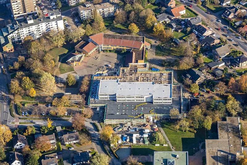 Aerial view, construction site new building Comenius comprehensive school Voerde, Voerde, Ruhr area, North Rhine-Westphalia, Germany, avenue, construction work, construction, construction area, building site, building plots, construction measure, construction project, construction site, education, educational institution, DE, Europe, comprehensive school, teaching institute, aerial view, aerial photography, aerial photography, new building, school, overview, bird's-eye view, overview