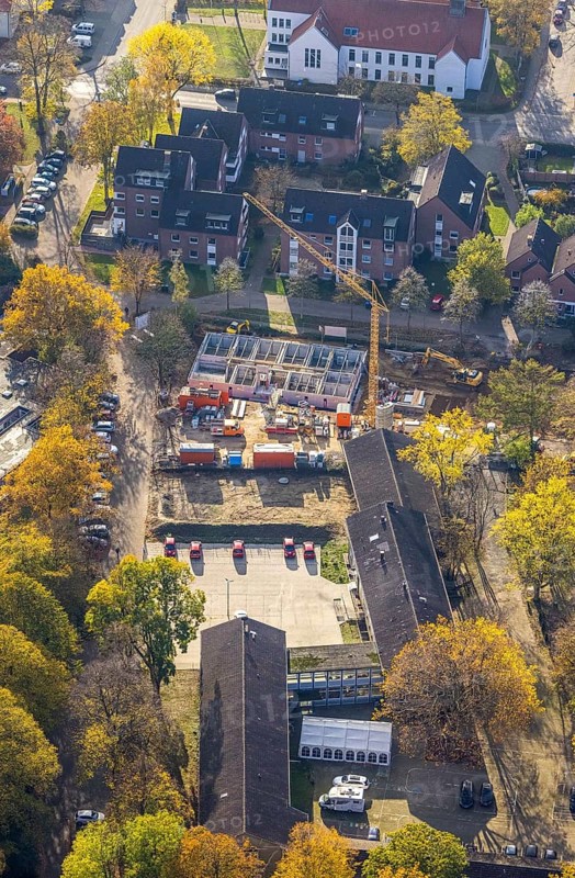 Aerial view, former Parkschule, construction site and new construction of rental flats for disabled people, Parkstraße corner Am Bauhof, Friedrichsfeld, Voerde, Ruhr area, North Rhine-Westphalia, Germany, construction work, building, construction area, building site, building plots, construction project, construction project, construction site, DE, Europe, property tax, real estate, aerial view, aerial photography, aerial photography, new construction, overview, bird's-eye view, residential complex, living and living, residential area, residential buildings, residential quality, residential neighbourhood, housing estate, birds-eyes view, overview