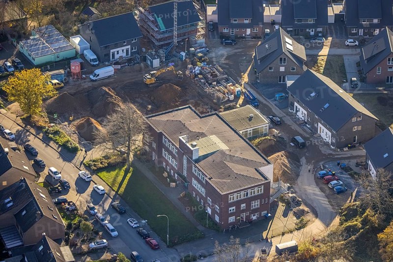 Aerial view, VHS Neukirchen-Vluyn, construction site, new building, residential area, Vluyn, Neukirchen-Vluyn, Ruhr area, North Rhine-Westphalia, Germany, construction work, building, construction area, building site, building plots, construction project, construction site, DE, Diesterwegstraße, Europe, property tax, real estate, aerial view, aerial photography, aerial photography, new construction, overview, bird's-eye view, housing estate, residential area, residential buildings, residential quality, residential neighbourhood, housing estate, birds-eyes view, overview
