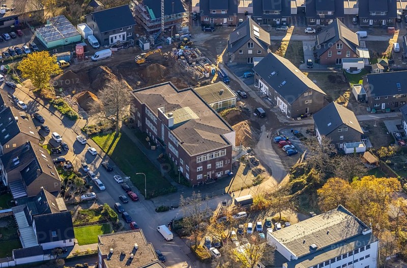 Aerial view, VHS Neukirchen-Vluyn, construction site, new building, residential area, Vluyn, Neukirchen-Vluyn, Ruhr area, North Rhine-Westphalia, Germany, construction work, building, construction area, building site, building plots, construction project, construction site, DE, Diesterwegstraße, Europe, property tax, real estate, aerial view, aerial photography, aerial photography, new construction, overview, bird's-eye view, housing estate, residential area, residential buildings, residential quality, residential neighbourhood, housing estate, birds-eyes view, overview
