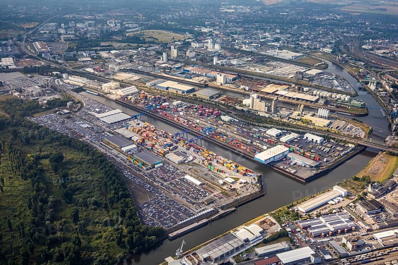 Aerial photo, harbour area, harbour facilities, Obererft, Neuss, city limits Düsseldorf, Rhineland, North Rhine-Westphalia, Germany, DE, Europe, birds-eyes view, aerial photo, aerial photography, aerial photography, overview, bird's eye view, harbour operating company, Neuss-Düsseldorfer Häfen GmbH & Co. KG, Contargo Neuss GmbH, Spedition Ansorge GmbH & Co. KG, Tanquid GmbH & Co. KG Tanklager Neuss I, Neuss customs office, Rhine, car transport, car loading, cargo ships, Neuss port, port of Neuss, port of Neuss, Rhine port, inland port, port facility, inland shipping