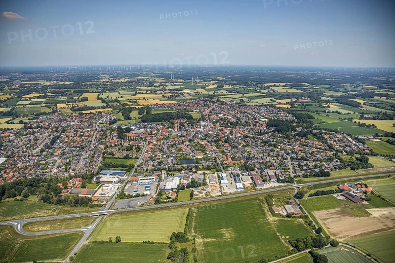 Aerial view, view of the town, Gildestraße industrial estate, Schwesternbusch woodland, St Dionysius Catholic Church, St Francis House, Cardinal von Galen Comprehensive School, Nordwalde, Münsterland, North Rhine-Westphalia, Germany. Franziskus-Haus, Kardinal von Galen Comprehensive School, Nordwalde, Münsterland, North Rhine-Westphalia, Germany, retirement home, retirement home for religious, retirement home, retirement home, place of worship, care and nursing, education, educational institution, DE, energy, Europe, distant view, comprehensive school, commercial enterprises, commercial area, commercial park, commercial location, commercial use, religious community, place of worship, industrial area, industrial site, church, parish, denomination, educational institute, aerial view, aerial photography, aerial photography, care facility, religion, school, retirement home, retirement residence, retirement home, retirement centre, townscape, urban area, overview, bird's-eye view, wind turb...