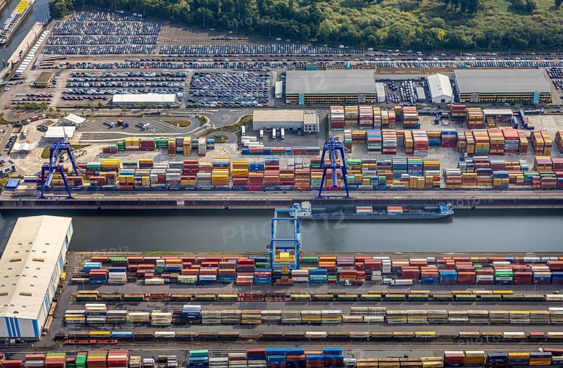 Aerial view, harbour area, harbour facilities, Contargo Neuss GmbH, container loading, container ship, Obererft, Neuss, city limits Düsseldorf, Rhineland, North Rhine-Westphalia, Germany, DE, Europe, birds-eyes view, aerial view, aerial photography, aerial photography, overview, bird's eye view, port operating company, Neuss-Düsseldorfer Häfen GmbH & Co. KG, Spedition Ansorge GmbH & Co. KG, Tanquid GmbH & Co. KG Tanklager Neuss I, Neuss customs office, Rhine, car transport, car loading, cargo ships, BLG AutoTransport GmbH & Co. KG, Neuss harbour, Neuss port, port of Neuss, Rhine port, inland port, port facility, inland shipping