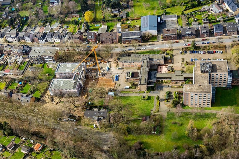 Aerial view, construction site new building Louise-Schroeder-Heim, Osterfeld, Oberhausen, Ruhr area, North Rhine-Westphalia, Germany, construction work, construction area, construction site, building plots, construction crane, construction measure, construction site, DE, Europe, capacity requirements, aerial view, aerial photography, aerial photography, medical facility, medical assistance, new building, nursing care, nursing home, Siepenstraße, overview, bird's eye view, growth, birds-eyes view, overview, medical care