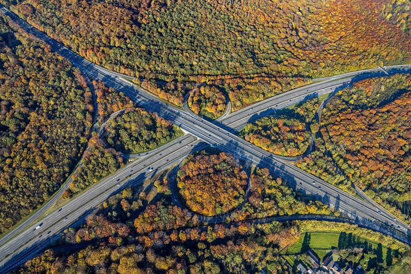 Aerial view, motorway junction Oberhausen, motorway A2, federal road B516, forest area in autumn colours, Königshardt, Oberhausen, Ruhr area, North Rhine-Westphalia, Germany, motorway bridge, motorway junction, bridge, DE, Europe, autumn colours, aerial view, aerial photography, aerial photography, overview, traffic volume, bird's-eye view, forest area, birds-eyes view, overview