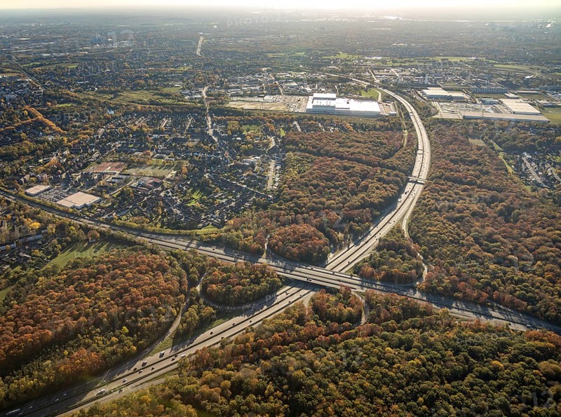 Aerial view, motorway junction Oberhausen, motorway A2, federal road B516, forest area in autumn colours, Walsumer Mark, Oberhausen, Ruhr area, North Rhine-Westphalia, Germany, motorway bridge, motorway junction, bridge, DE, Europe, autumn colours, aerial view, aerial photography, aerial photography, overview, traffic volume, bird's-eye view, forest area, birds-eyes view, overview