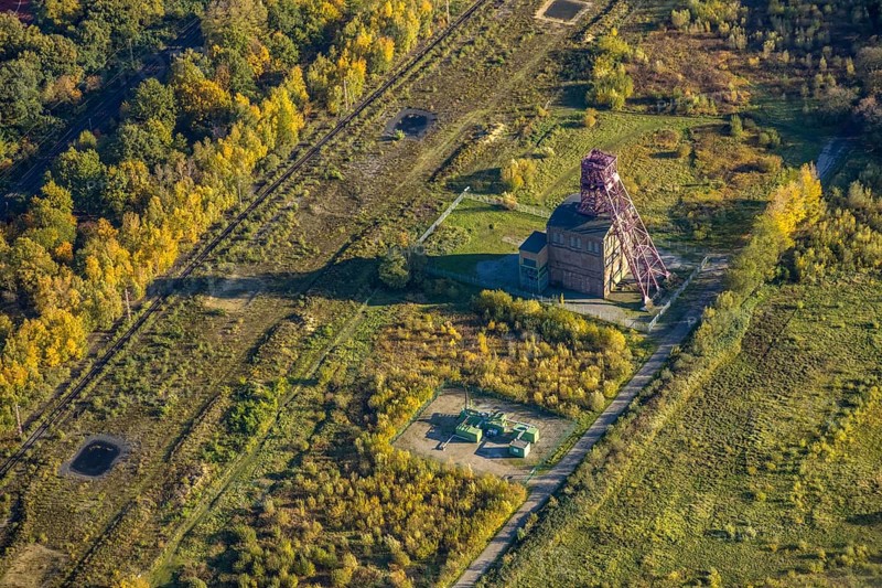 Aerial view, historic colliery winding tower shaft 1 Sterkrade colliery, Schwarze Heide, Oberhausen, Ruhr area, North Rhine-Westphalia, Germany, DE, monument, Europe, green area, autumn colours, aerial view, aerial photography, aerial photography, overview, bird's eye view, Von-Trotha-Straße, birds-eyes view, historic sight, overview