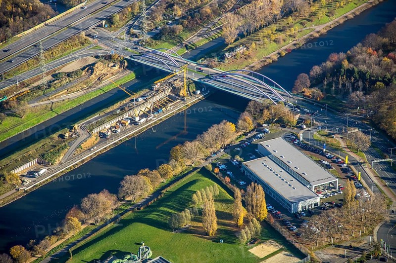Aerial view, construction site between Rhine-Herne-Canal and Emscher, bridge Osterfelder Straße, Borbeck, Oberhausen, Ruhr area, North Rhine-Westphalia, Germany, motorway A42, car dealership Bernds, construction work, building, construction area, building site, building plots, construction project, construction site, bridge, DE, Europe, canal, aerial view, aerial photography, aerial photography, new building, overview, bird's-eye view, overview