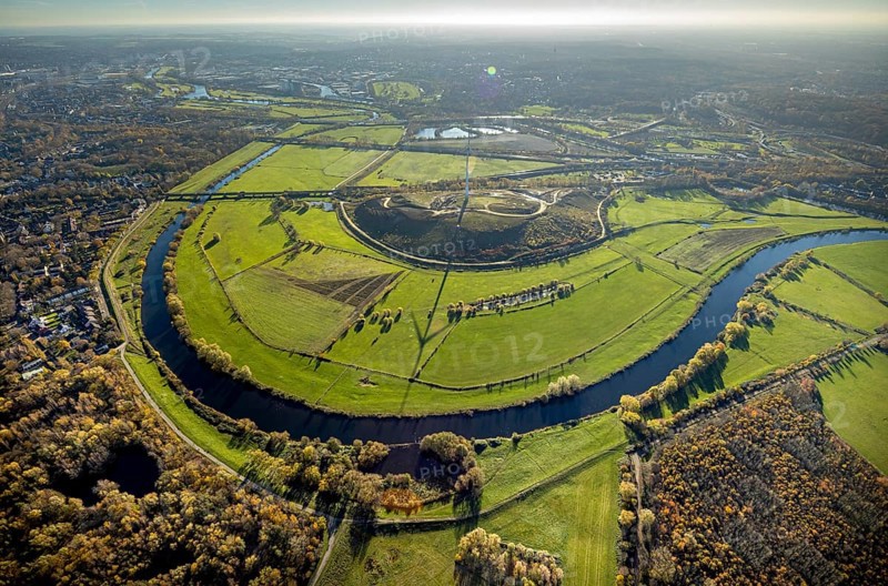 Aerial view, Styrumer Ruhrbogen, Ruhrwiesen, landfill Kolkerhofweg, city triangle Duisburg-Oberhausen-Mülheim, wind turbine, river Ruhr, Mülheim an der Ruhr, Ruhr area, North Rhine-Westphalia, Germany, bridge over the Ruhr, DE, railway bridge, Europe, distant view, flood, aerial view, aerial photography, aerial photography, Ruhr floodplain, Ruhr valley cycle path, Ruhr river bank, Speldorfer Straße, overview, bird's-eye view, wind energy, wind turbine, wind power, wind energy plant, wind turbines, birds-eyes view, overview, flooding