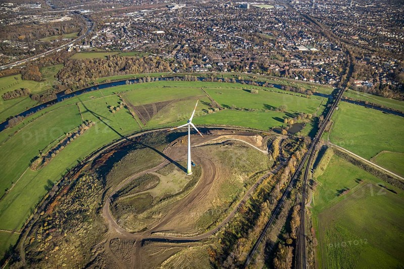 Aerial view, Styrumer Ruhrbogen, Ruhrwiesen, landfill Kolkerhofweg, city triangle Duisburg-Oberhausen-Mülheim, wind turbine, river Ruhr, Mülheim an der Ruhr, Ruhr area, North Rhine-Westphalia, Germany, bridge over the Ruhr, DE, railway bridge, Europe, distant view, flood, aerial view, aerial photography, aerial photography, Ruhr floodplain, Ruhr valley cycle path, Ruhr river bank, Speldorfer Straße, overview, bird's-eye view, wind energy, wind turbine, wind power, wind energy plant, wind turbines, birds-eyes view, overview, flooding