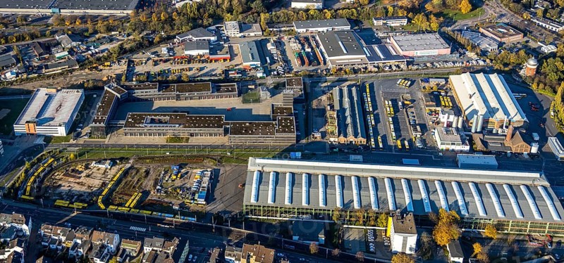 Aerial view, Depot Ruhrbahn GmbH, Alte Dreherei, fire brigade, Broich - Ost, Mülheim an der Ruhr, Ruhr area, North Rhine-Westphalia, Germany, fire fighter, fire protection, fire station, DE, Europe, fire station, green trees, main workshop, autumn colours, aerial view, aerial photography, aerial photography, rescue station, overview, bird's-eye view, old railway depot, birds-eyes view, overview