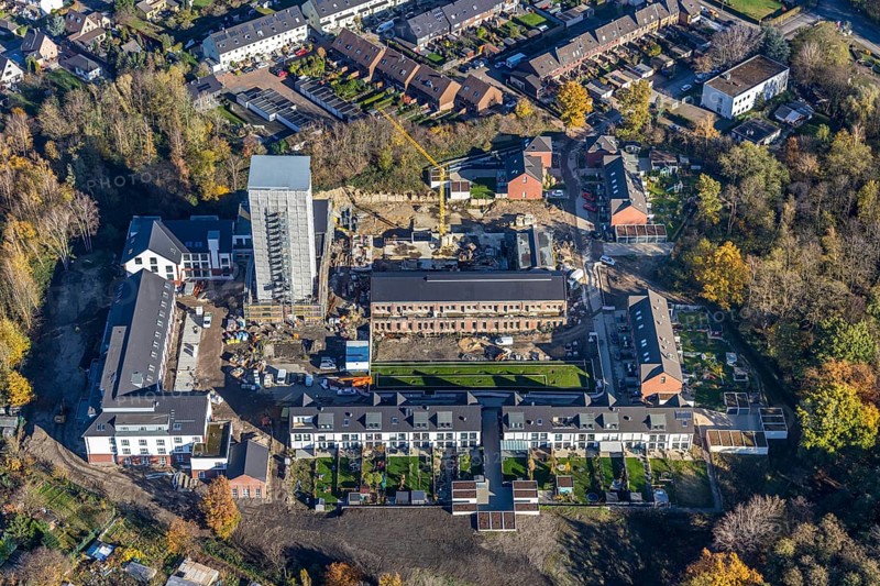 Aerial view, construction site, housing estate Am Schacht IV, Klosterhardt, Oberhausen, Ruhr area, North Rhine-Westphalia, Germany, construction work, building, construction area, building site, building plots, construction project, construction site, DE, monument protection, Europe, property tax, real estate, aerial photograph, aerial photography, aerial photography, renovation, redevelopment, tower, overview, cladding, bird's-eye view, housing estate, housing and living, residential area, residential buildings, quality of living, residential neighbourhood, housing estate, birds-eyes view, heritage-protected tower, former Osterfeld colliery, overview