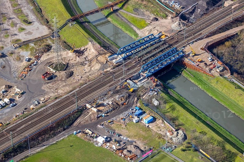 Aerial view, new construction, insertion railway bridge over the Emscher, Sterkrade, Oberhausen, Ruhr area, North Rhine-Westphalia, Germany, construction work, construction area, building site, building plots, construction measure, construction project, construction site, bridge structure, DE, railway bridge, renewal, Europe, river Emscher, capacity requirement, aerial view, aerial photography, aerial photography, new construction, renovation, refurbishment, overview, bird's-eye view, overview