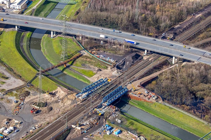 Aerial view, new construction, insertion railway bridge over the Emscher, motorway A42, Sterkrade, Oberhausen, Ruhr area, North Rhine-Westphalia, Germany, construction work, construction area, construction site, construction site, construction project, construction site, bridge construction, DE, railway bridge, renewal, Europe, river Emscher, capacity requirement, aerial view, aerial photography, aerial photography, new construction, renovation, refurbishment, overview, bird's-eye view, overview