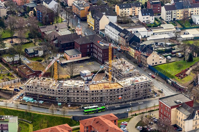 Aerial view, construction site new building Steinbrinkstraße Eugen-Zur-Nieden-Ring, Friedenskirche, Evang. Kindergarten, Steinbrinkschule, Sterkrade, Oberhausen, Ruhr area, North Rhine-Westphalia, Germany, construction work, construction vehicles, construction area, construction site, building plots, construction crane, construction measure, construction project, construction site, educational institution, DE, Europe, faith community, house of worship, capacity requirement, kindergarten, day-care centre, day-care facility, church, parish, day-care centre, denomination, educational institute, aerial view, aerial photography, aerial photography, new building, religion, school, overview, bird's-eye view, overview