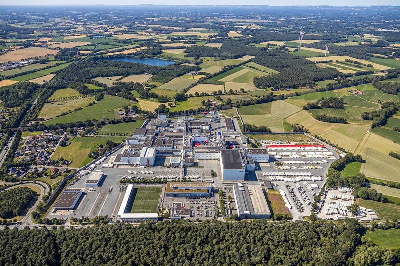 Aerial view, Corona at Tönnies, headquarters of Fleischfabrik Tönnies Lebensmittel GmbH & Co. KG, Nordrheda-Ems, Rheda-Wiedenbrück, Ostwestfalen, North Rhine-Westphalia, Germany, DE, Europe, birds-eyes view, aerial view, aerial photography, aerial photography, overview, bird's eye view, corona outbreak at Tönnies meat factory, air cooling, cutting plant, slaughterhouse, lock-down, corona pandemic, pandemic, don't call it Schnitzel, Tillmans, Tillman's, lorry trailer, refrigerated trailer, company closure