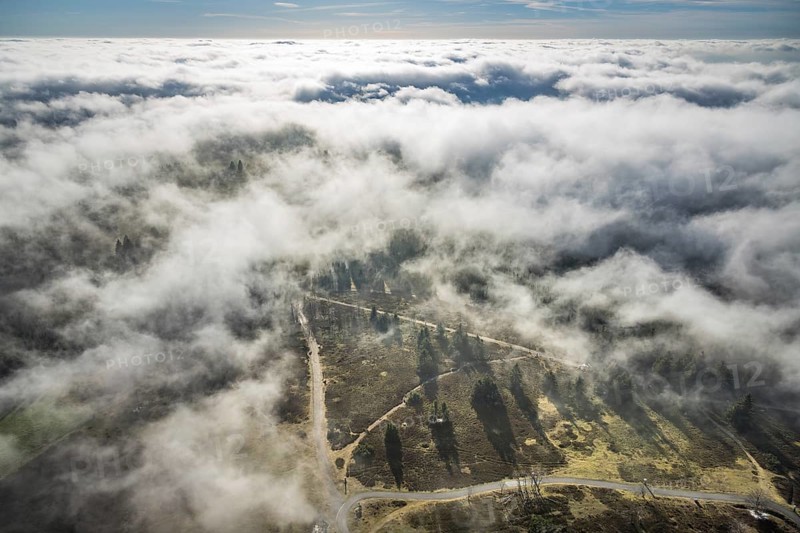 Aerial view, clouds over the Kahler Asten, highest mountain in North Rhine-Westphalia, Kahler Asten, 842 m high mountain with heathland as well as observation tower and restaurant on the summit, Winterberg, Sauerland, North Rhine-Westphalia, Germany