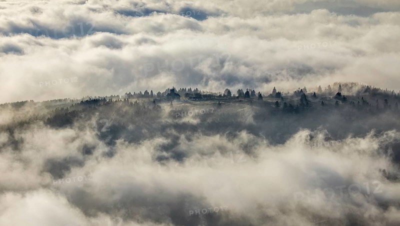 Aerial view, clouds over the Kahler Asten, Astenturm and hotel-restaurant, second highest mountain in North Rhine-Westphalia, Kahler Asten, 842 m high mountain with heathland as well as observation tower and restaurant on the summit, Winterberg, Sauerland, North Rhine-Westphalia, Germany